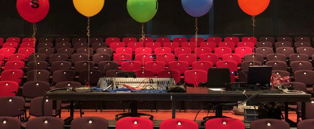 Een theater vol met drijfveren van geluk
